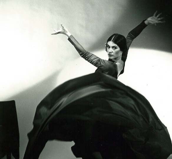 Black and white photo of woman dancing.