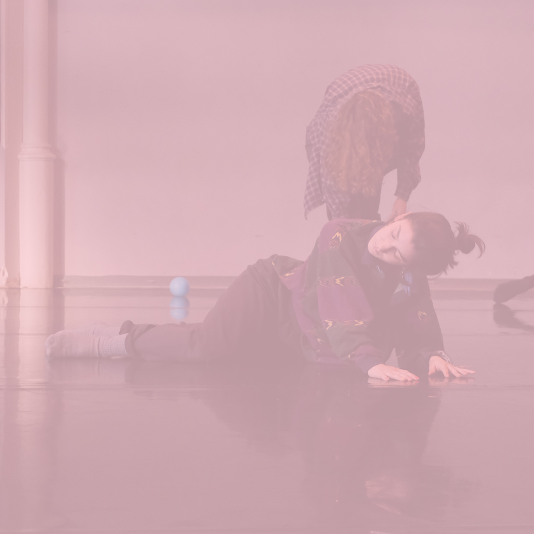 A graphic with two dancers. One moves on the floor, both hands pressed to the ground, their head is tilted to the side. The dancer behind them is folder forward, long hair obscuring their face.